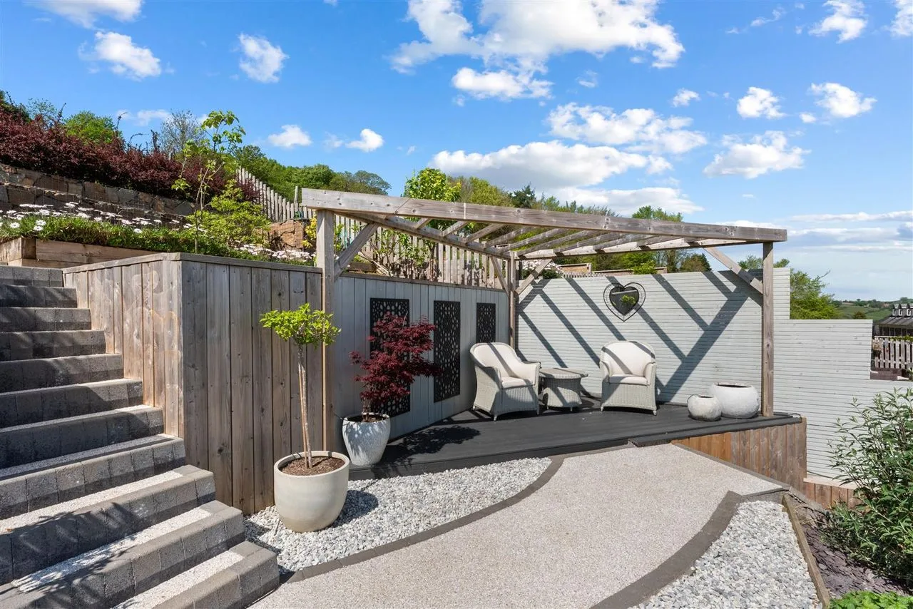 Terraced garden landscaping with lawn and planting